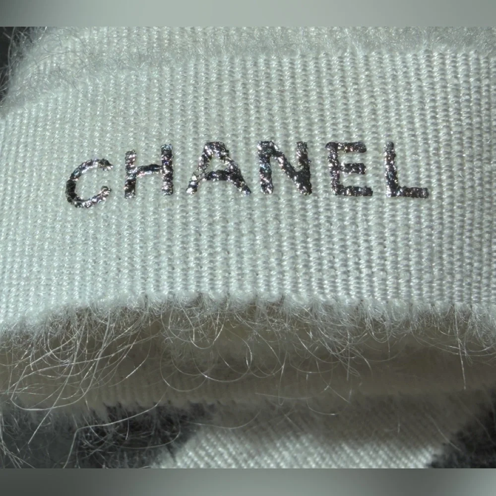 CHANEL 1 CAMELIA FLOWER AND Silver Chanel printed RIBBON,  plus Chanel card.